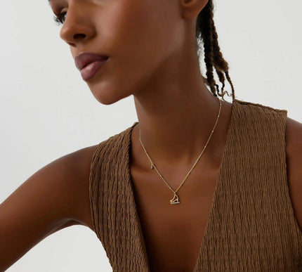 Ice Skate Charm Necklace – 18K Gold-Plated Sterling Silver with Sparkling Accents - Dabas Minimalist