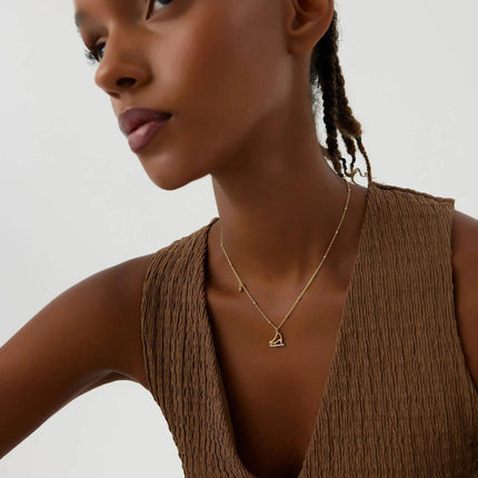Ice Skate Charm Necklace – 18K Gold-Plated Sterling Silver with Sparkling Accents - Dabas Minimalist