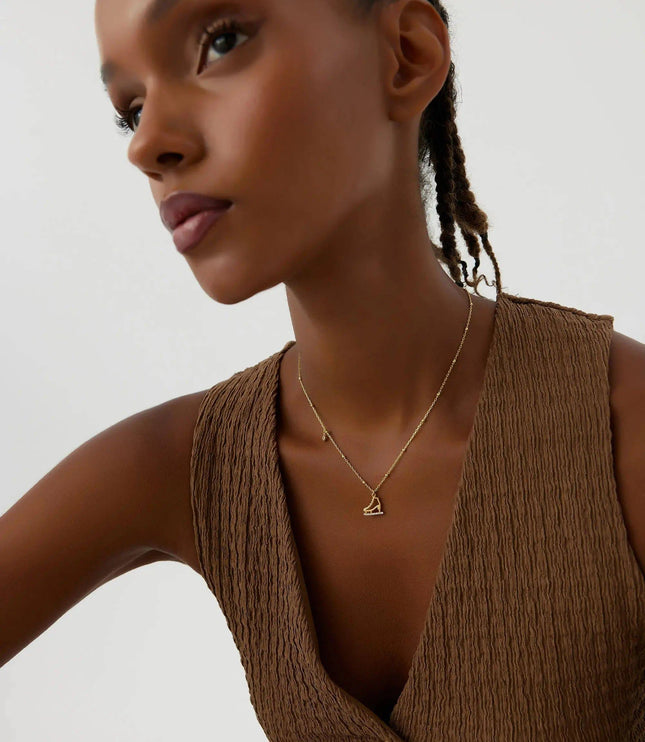 Ice Skate Charm Necklace – 18K Gold-Plated Sterling Silver with Sparkling Accents - Dabas Minimalist