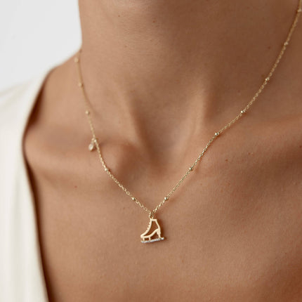 Ice Skate Charm Necklace – 18K Gold-Plated Sterling Silver with Sparkling Accents - Dabas Minimalist
