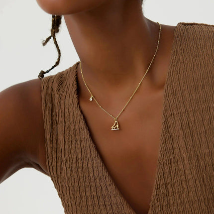 Ice Skate Charm Necklace – 18K Gold-Plated Sterling Silver with Sparkling Accents - Dabas Minimalist